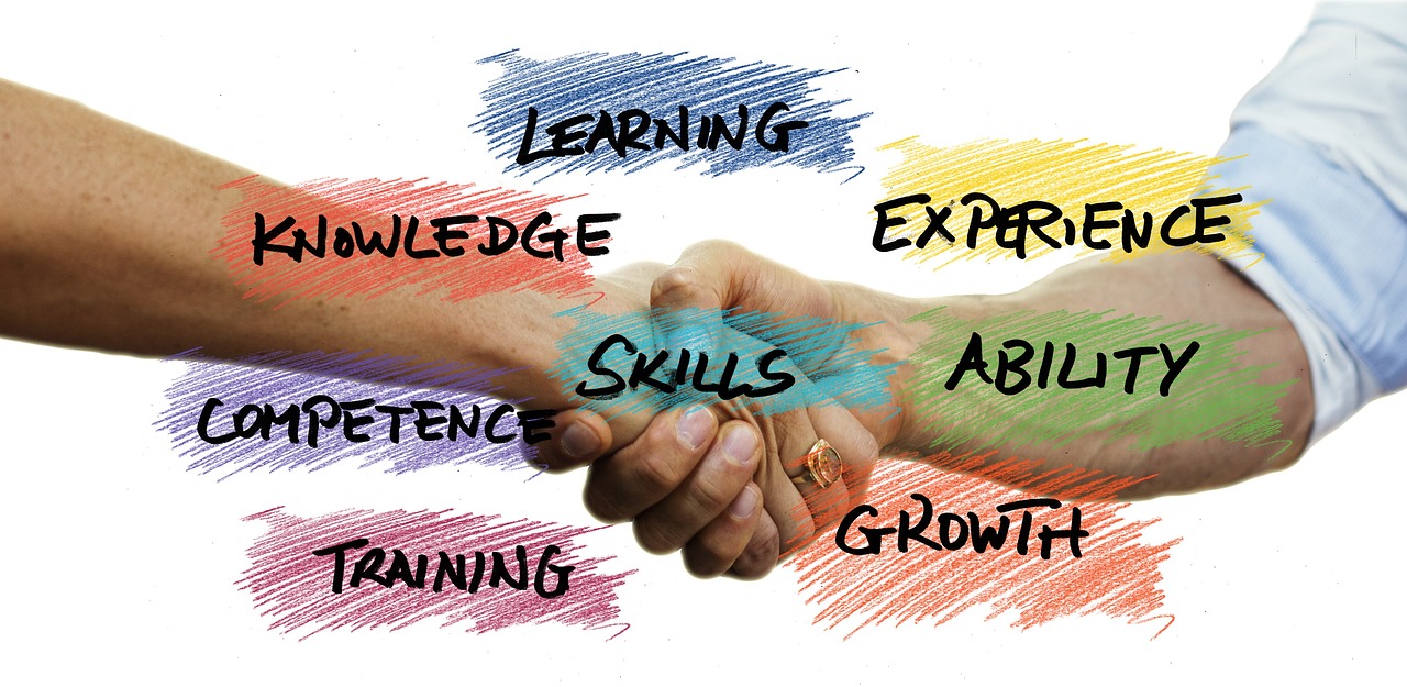 Realtor and client shaking hands, highlighting the difference between a realtor and real estate agent through knowledge, ethics, professional standards, and market expertise
